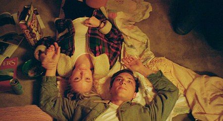 Costume design by Anette Cseri for the film The Tribes of Palos Verdes: two teenagers lying among scattered sweet wrappers